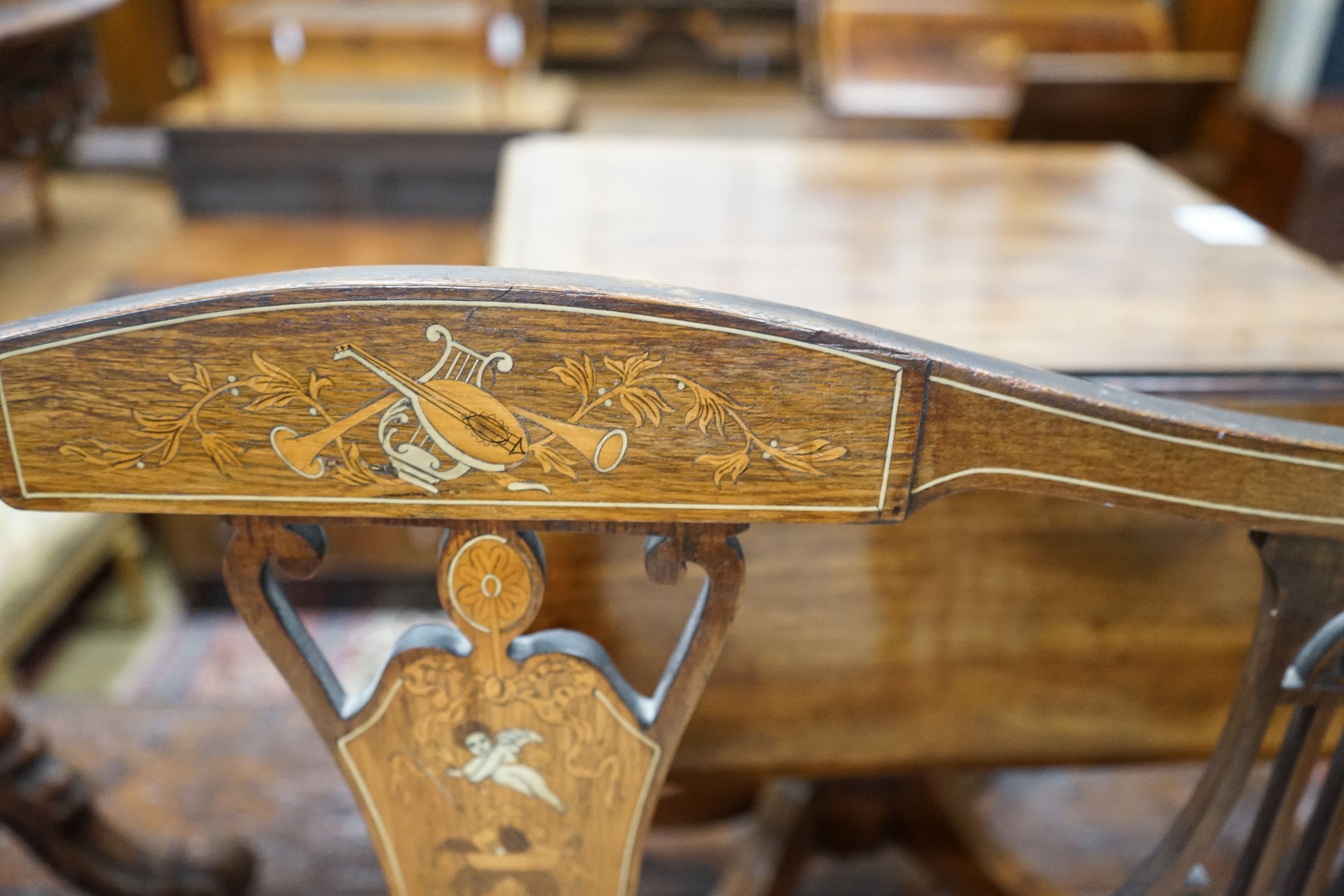 An Edwardian marquetry inlaid mahogany window seat, length 107cm, depth 44cm, height 79cm